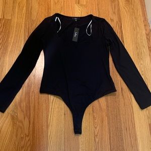Never- worn black LuLu’s body suit
